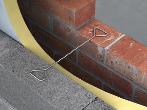 Masonry to masonry wall tie in situ